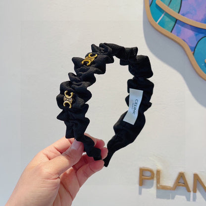 BLACK FABRIC WITH GOLD LOGO HAIRBAND 415931