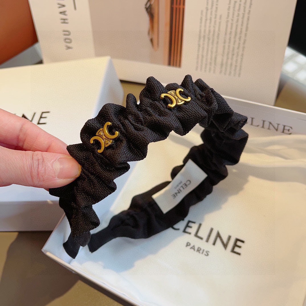 BLACK FABRIC WITH GOLD LOGO HAIRBAND 415931
