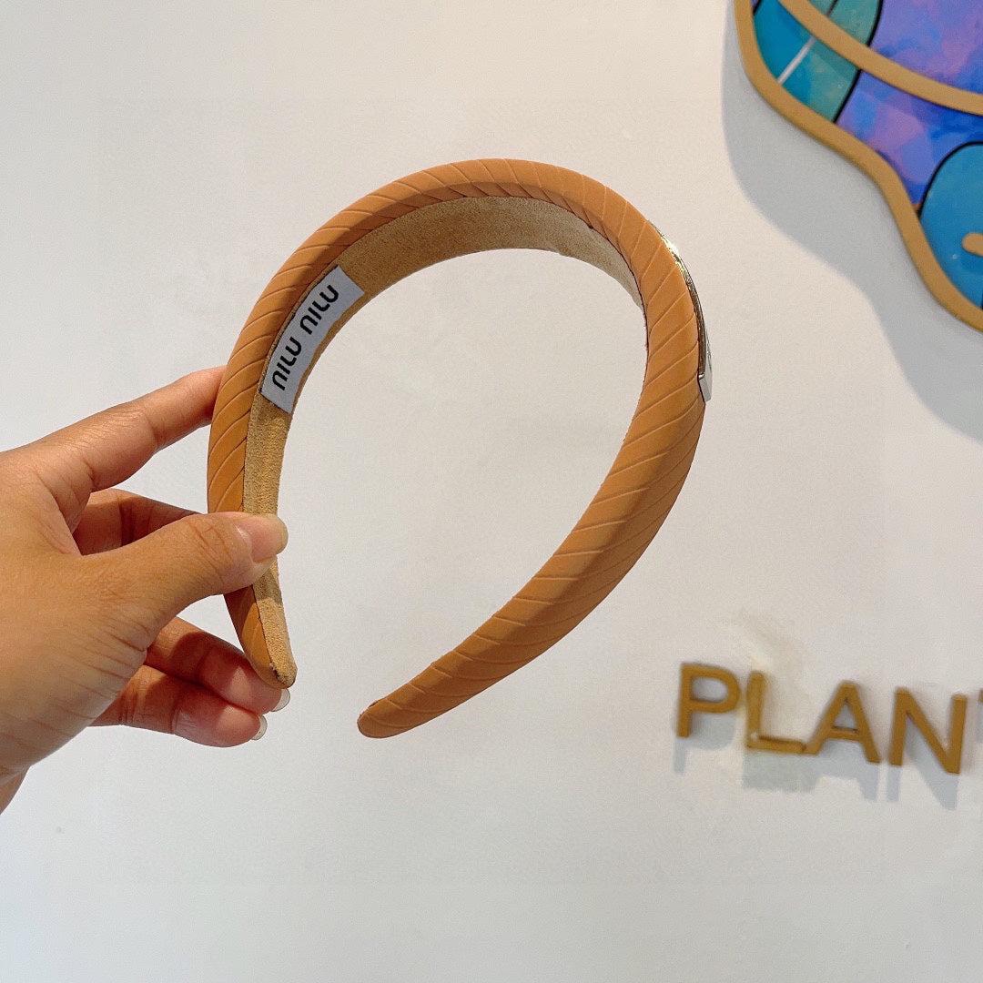 THICK HEADBAND IN BRONZE ORANGE DIAGONAL LEATHER 425479