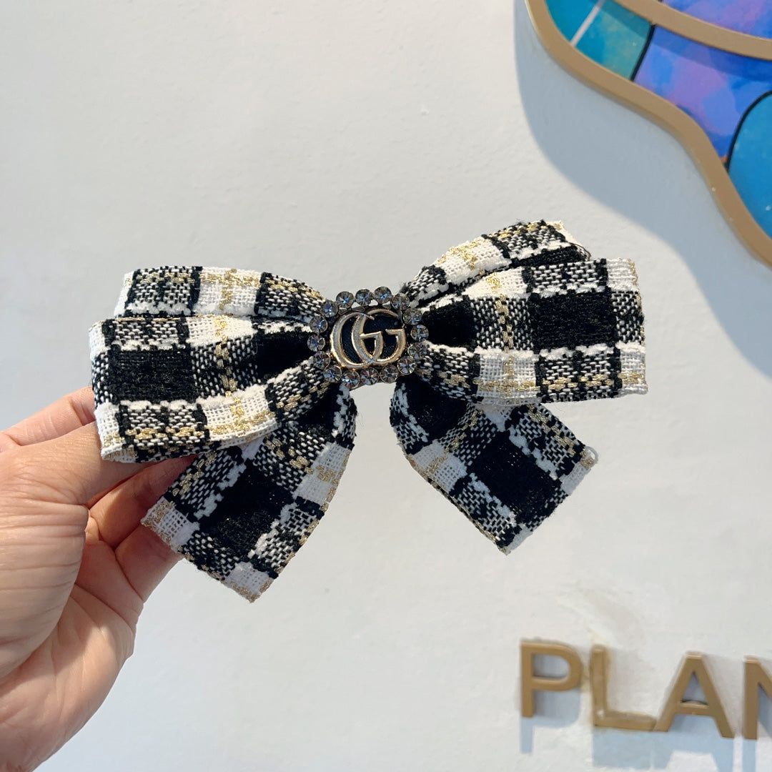RETRO BOW HAIR CLIP IN BLACK MIX WHITE TWEED 432763