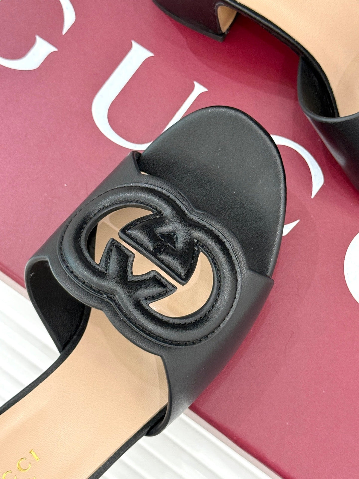 MID-HEEL MULE IN BLACK CALFSKIN