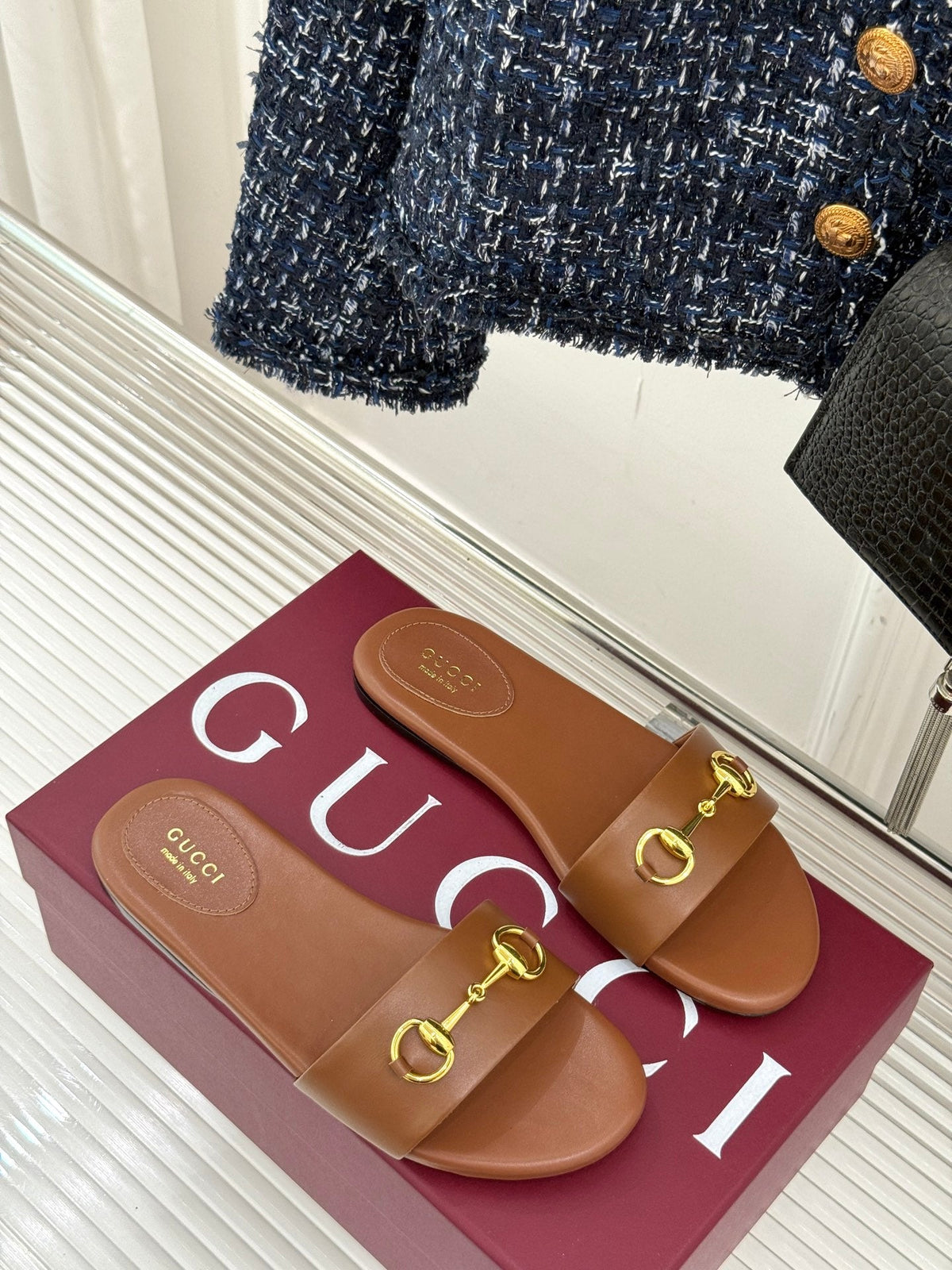 SLIDE SANDALS IN BROWN CALFSKIN WITH GOLD HARDWARE