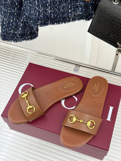 SLIDE SANDALS IN BROWN CALFSKIN WITH GOLD HARDWARE