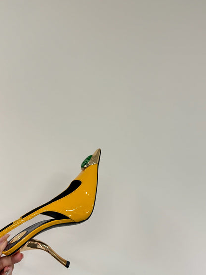 GREEN GEM-STUDDED SLINGBACK PUMPS IN YELLOW PATENT CALFSKIN