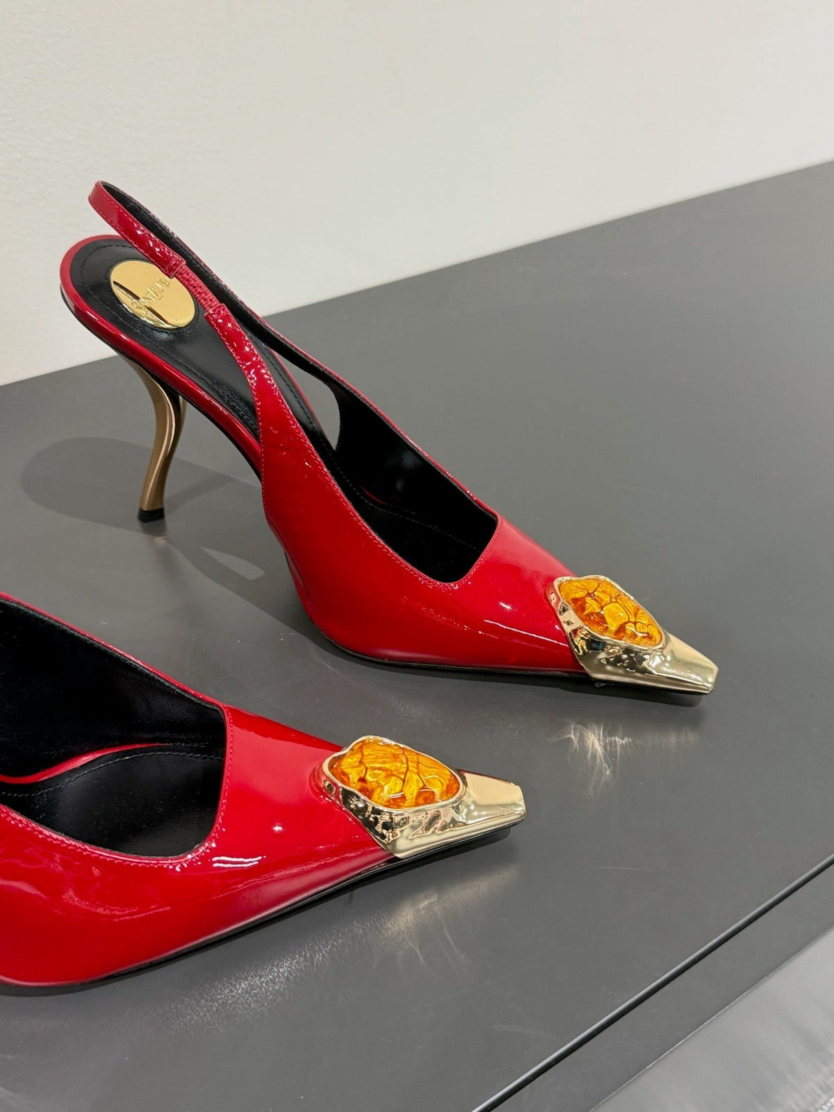 ORANGE GEM-STUDDED SLINGBACK PUMPS IN RED PATENT CALFSKIN