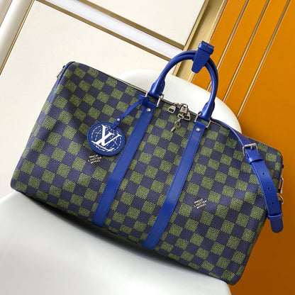 KEEPALL BANDOULIÈRE 50 IN BLUE GREEN DAMIER HERITAGE COATED CANVAS