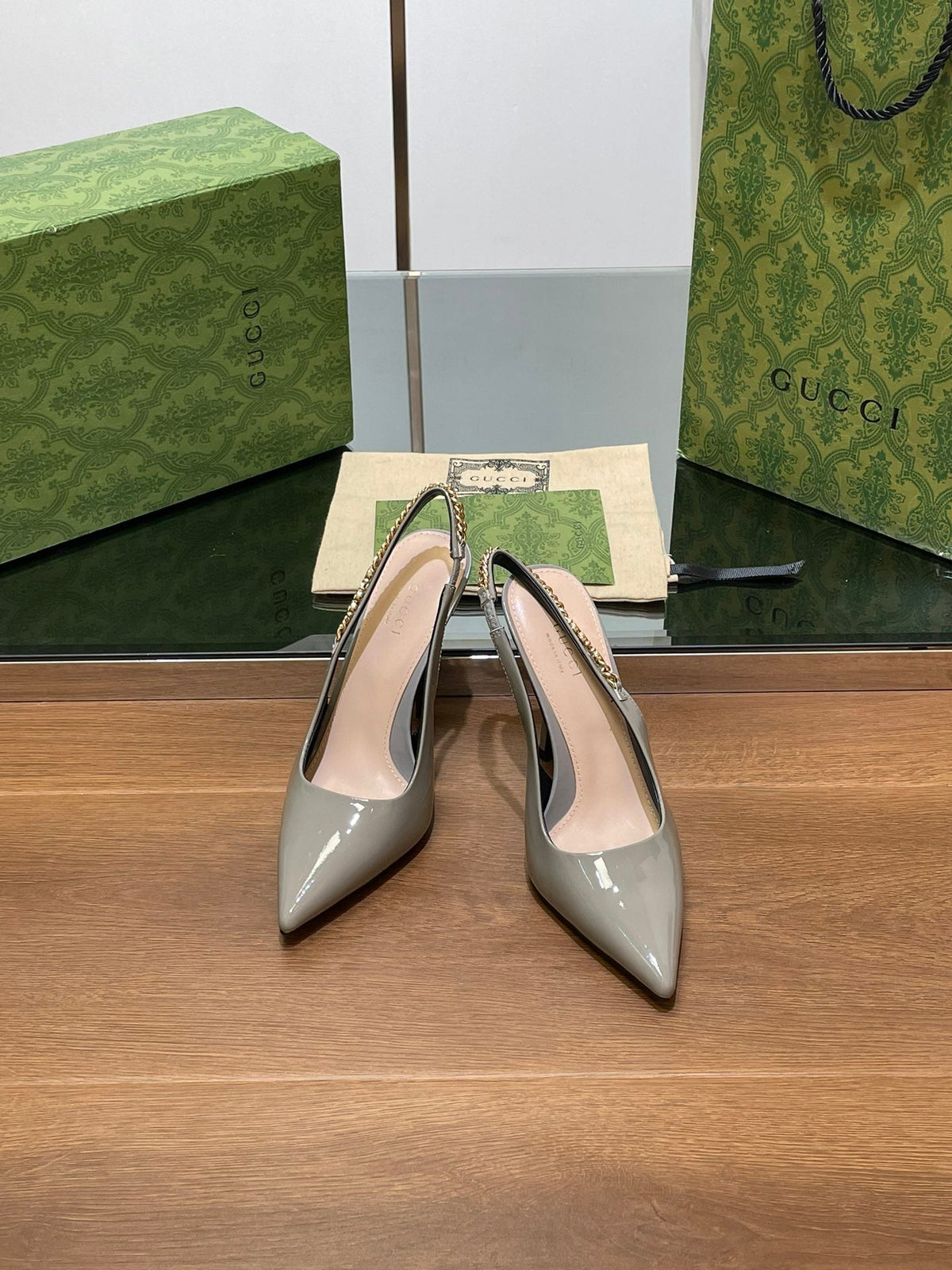 GG HIGH SLINGBACK 10.5 CM IN DOVE GREY GLOSSY CALFSKIN WITH GOLD HARDWARE