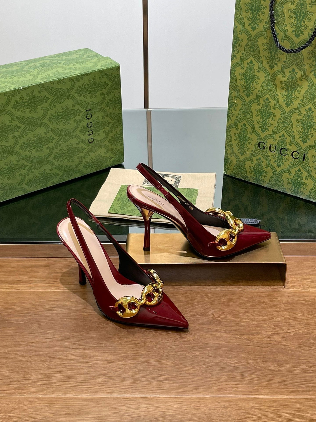 GG HIGH SLINGBACK 10.5 CM IN WINE RED GLOSSY CALFSKIN WITH GOLD HARDWARE