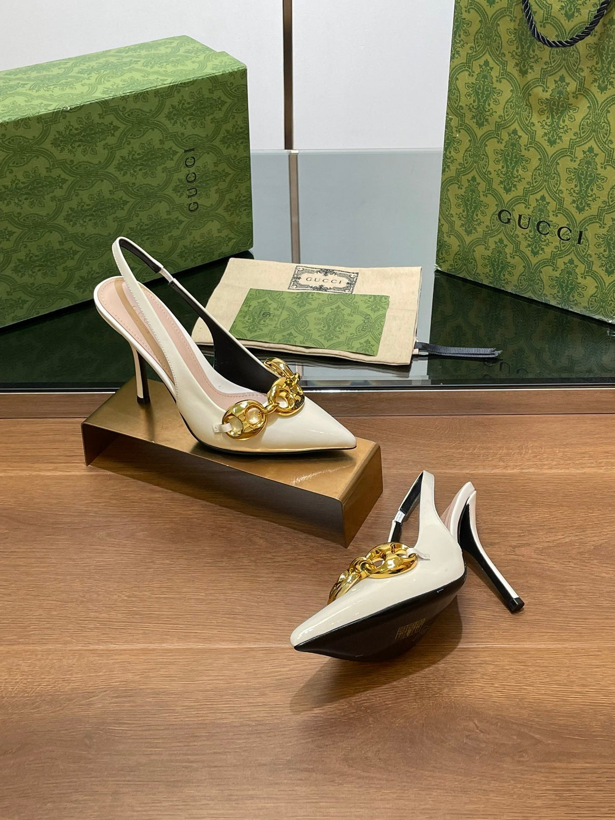 GG HIGH SLINGBACK 10.5 CM IN WHITE GLOSSY CALFSKIN WITH GOLD HARDWARE