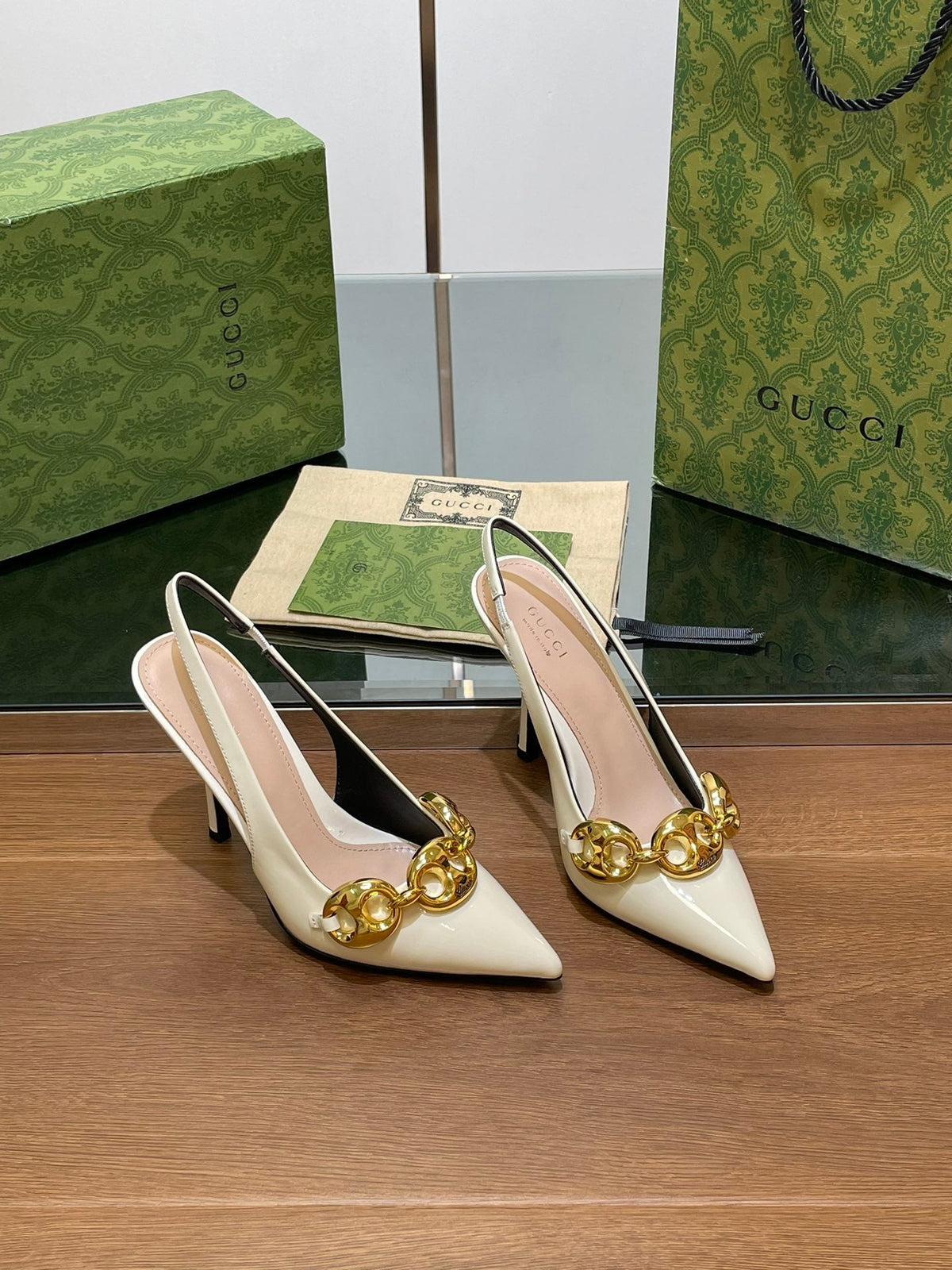 GG HIGH SLINGBACK 10.5 CM IN WHITE GLOSSY CALFSKIN WITH GOLD HARDWARE