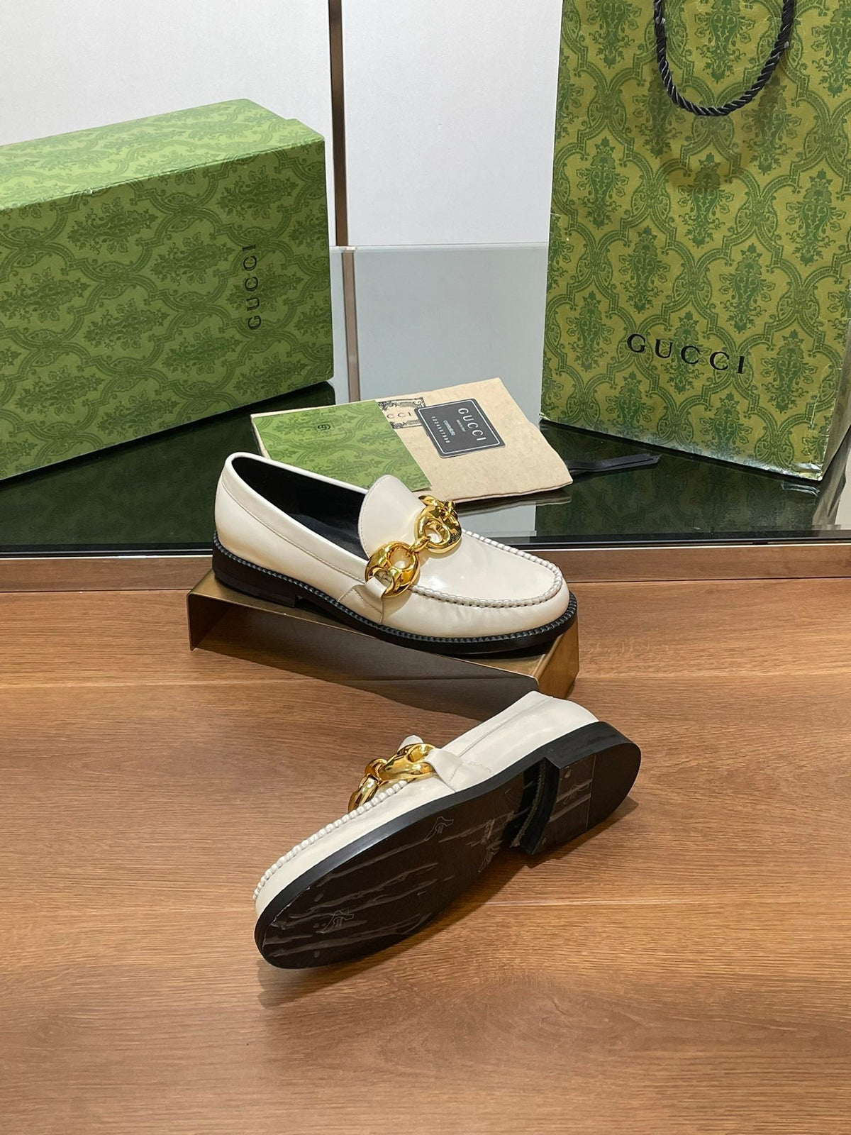 GG LOAFER SHOES IN WHITE CALFSKIN WITH GOLD HARDWARE
