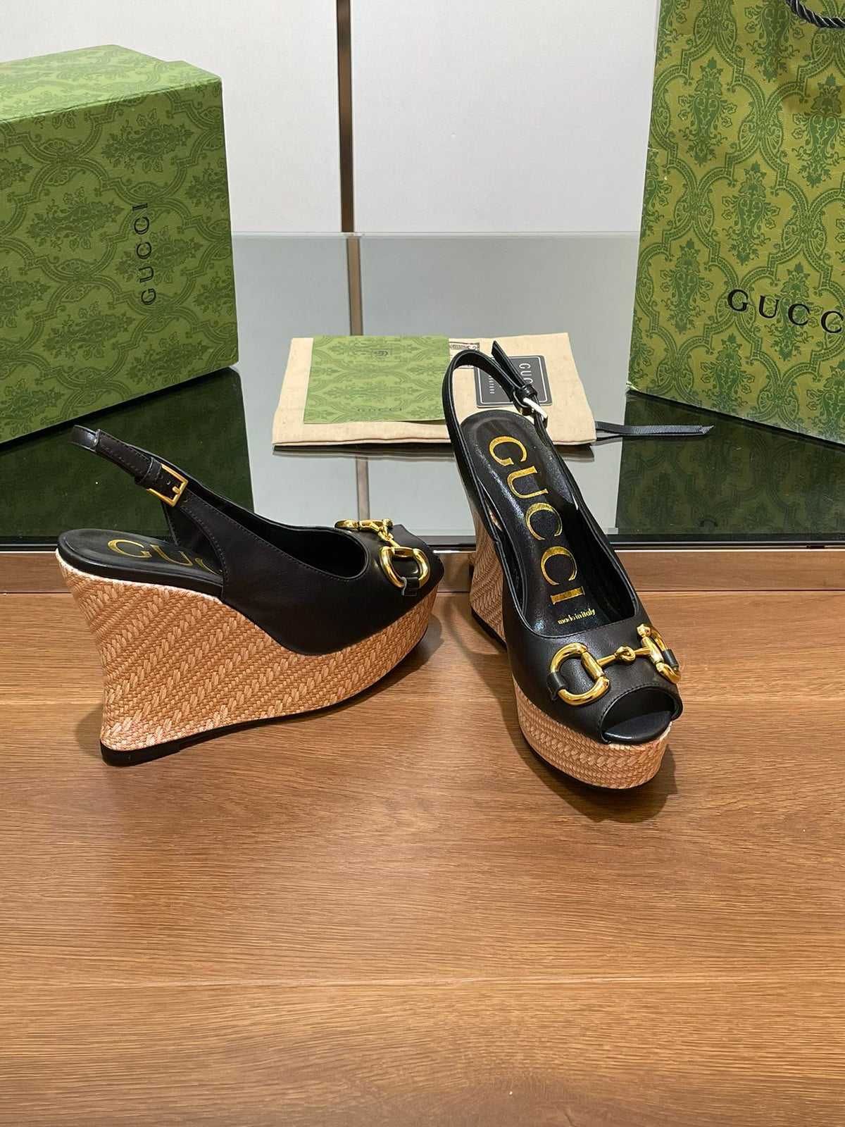 GG WEDGE PLATFORM IN BLACK CALFSKIN WITH GOLD HARDWARE