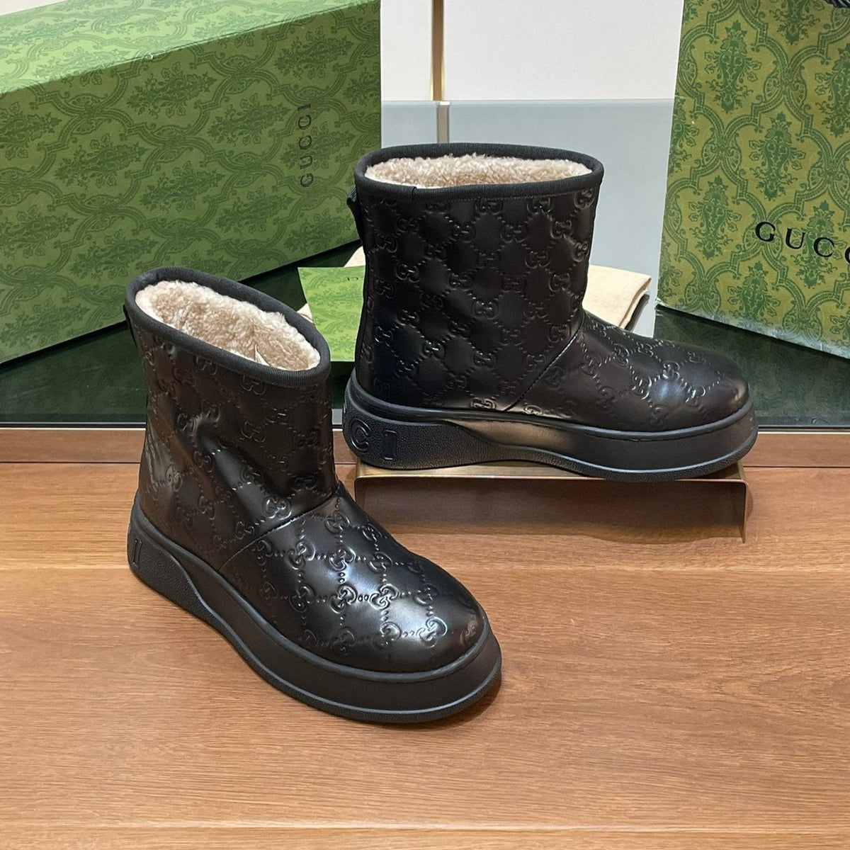 GG UGG BOOTS IN BLACK EMBOSSED DEERSKIN AND BEIGE WOOL LINING