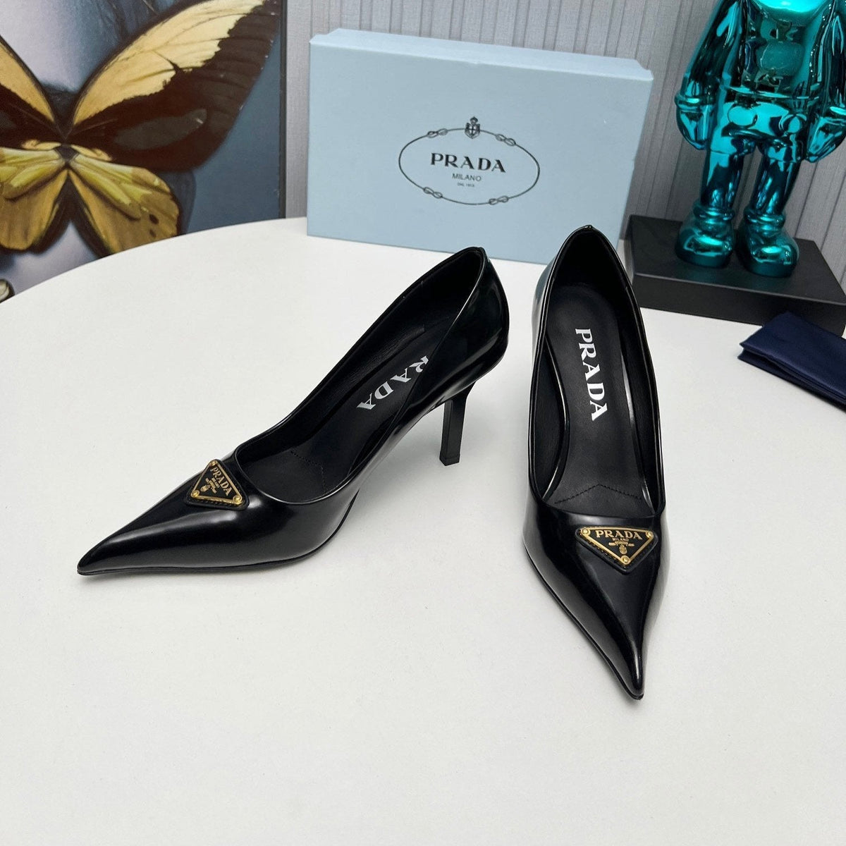 HIGH-HEEL PUMPS IN BLACK CALFSKIN