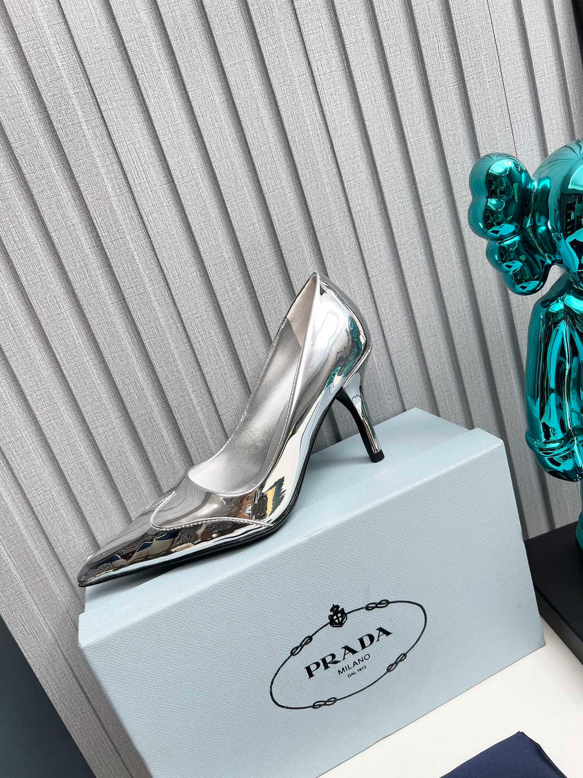 HIGH POINTED-TOE PUMPS IN SILVER GLOSSY CALFSKIN