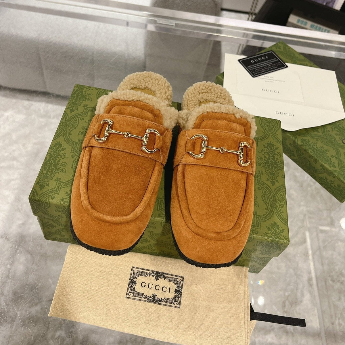 HORSEBIT MULE IN BRONZE ORANGE SUEDE AND FLEECE LINING