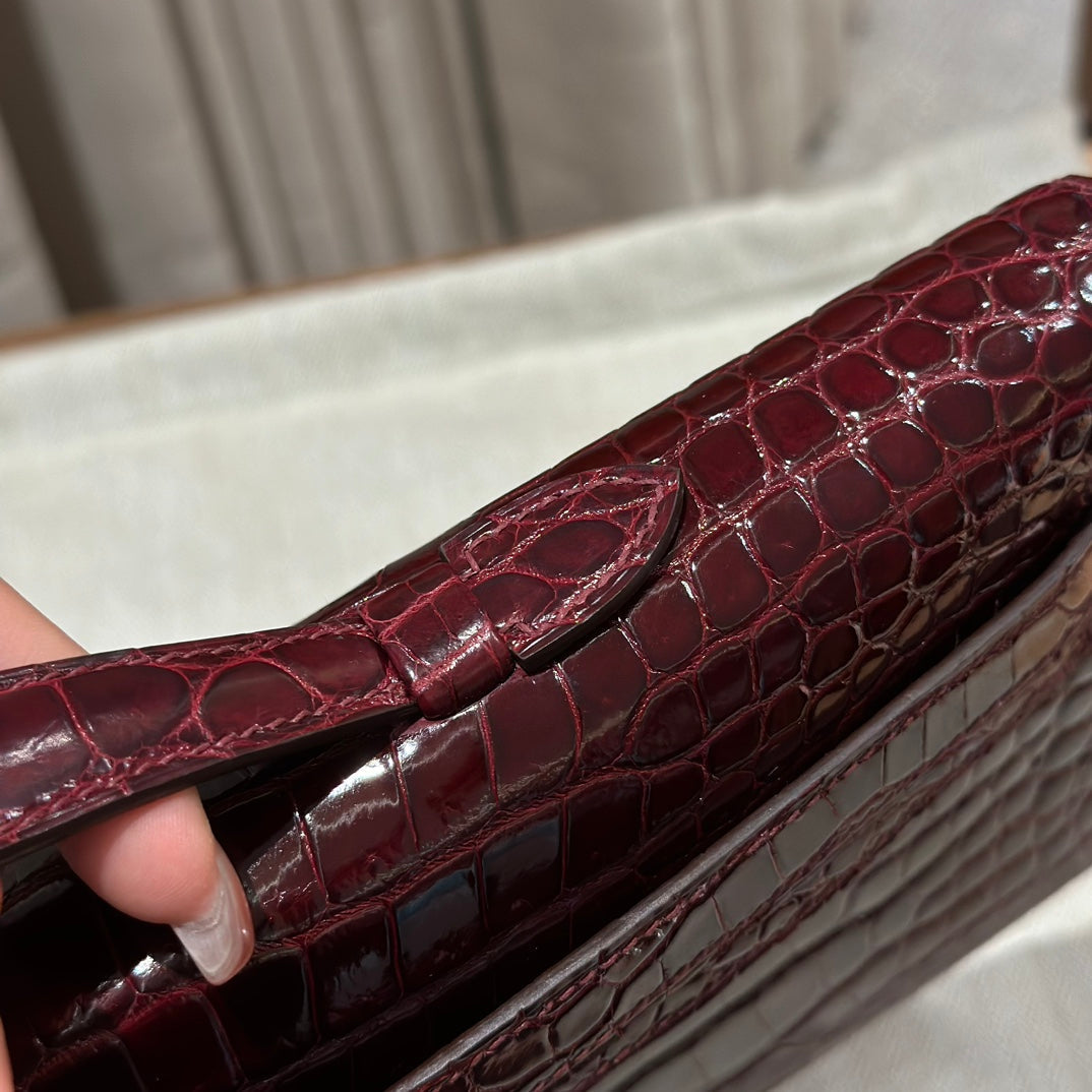 KELLY CUT 31 IN SANGRIA PURPLE ALLIGATOR LEATHER WITH GOLD HARDWARE