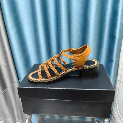HIGH SANDALS WITH THREE STRAPS IN OCHRE YELLOW CALFSKIN
