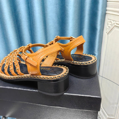 HIGH SANDALS WITH THREE STRAPS IN OCHRE YELLOW CALFSKIN
