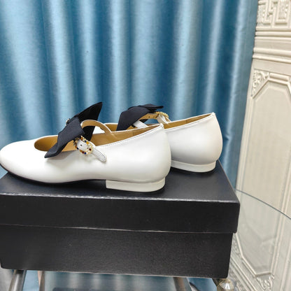 MARY JANE SHOES WHITE SHEEPSKIN WITH BLACK BOW