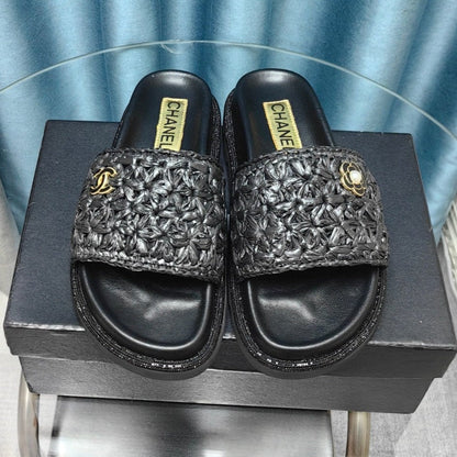 KNIT SLIPPERS IN BLACK WOVEN SATIN AND SHEEPSKIN