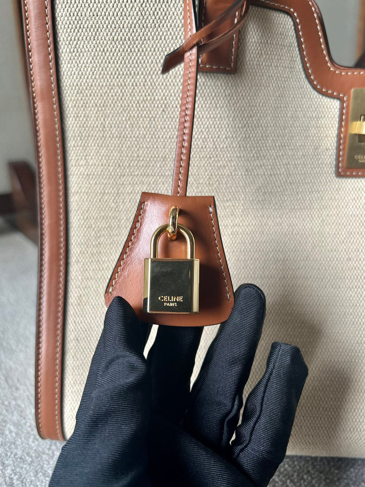 CABAS 37 IN WHITE CANVAS AND BRONZE BROWN CALFSKIN TRIM GOLD LOCK