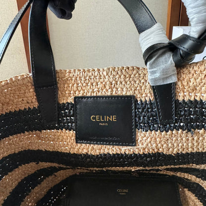 STRIPED COUFFIN CLASSIC PANIER 22 IN BEIGE AND BLACK RAFFIA AND CALFSKIN TRIM