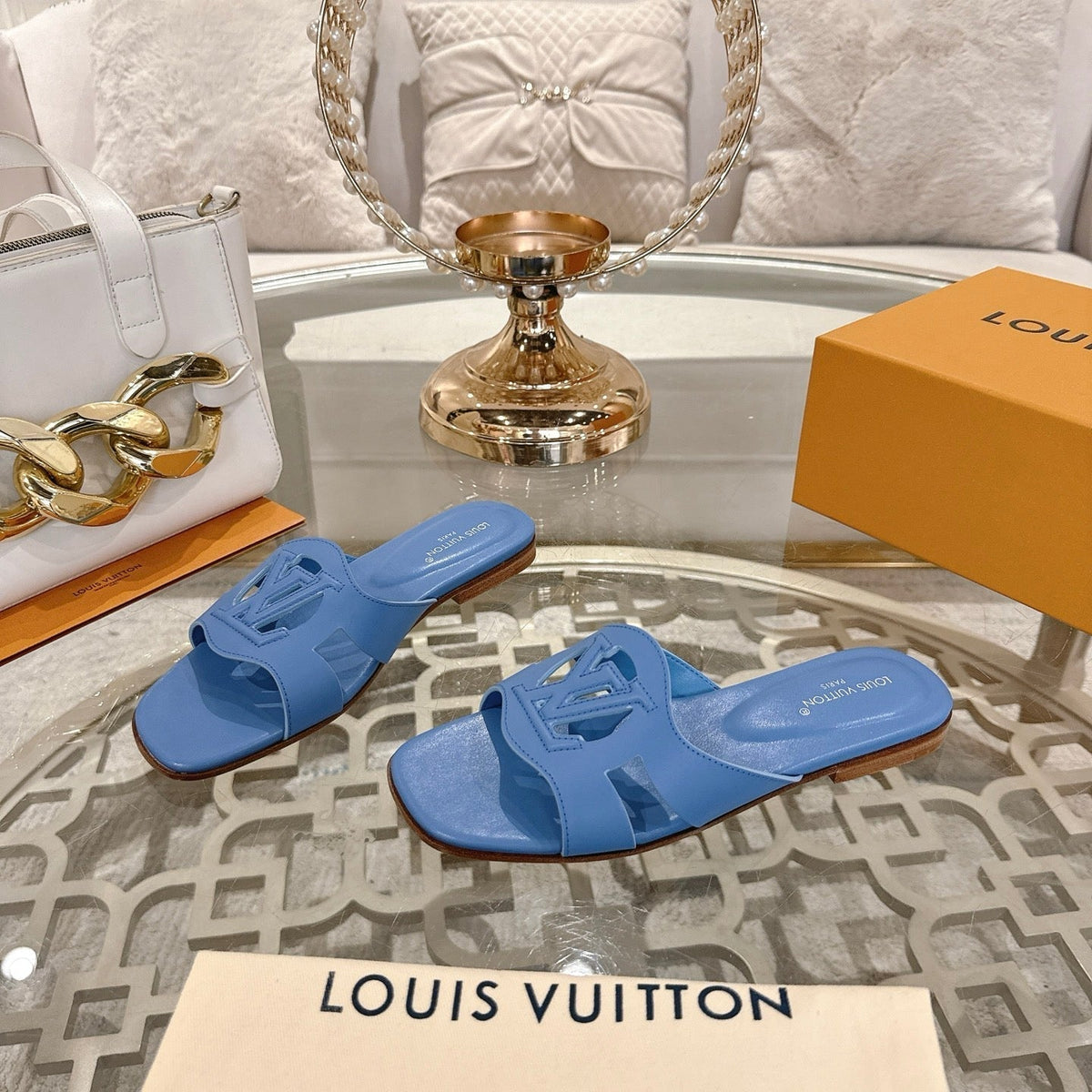 ISOLA FLAT SLIDE IN CORNFLOWER BLUE CALFSKIN