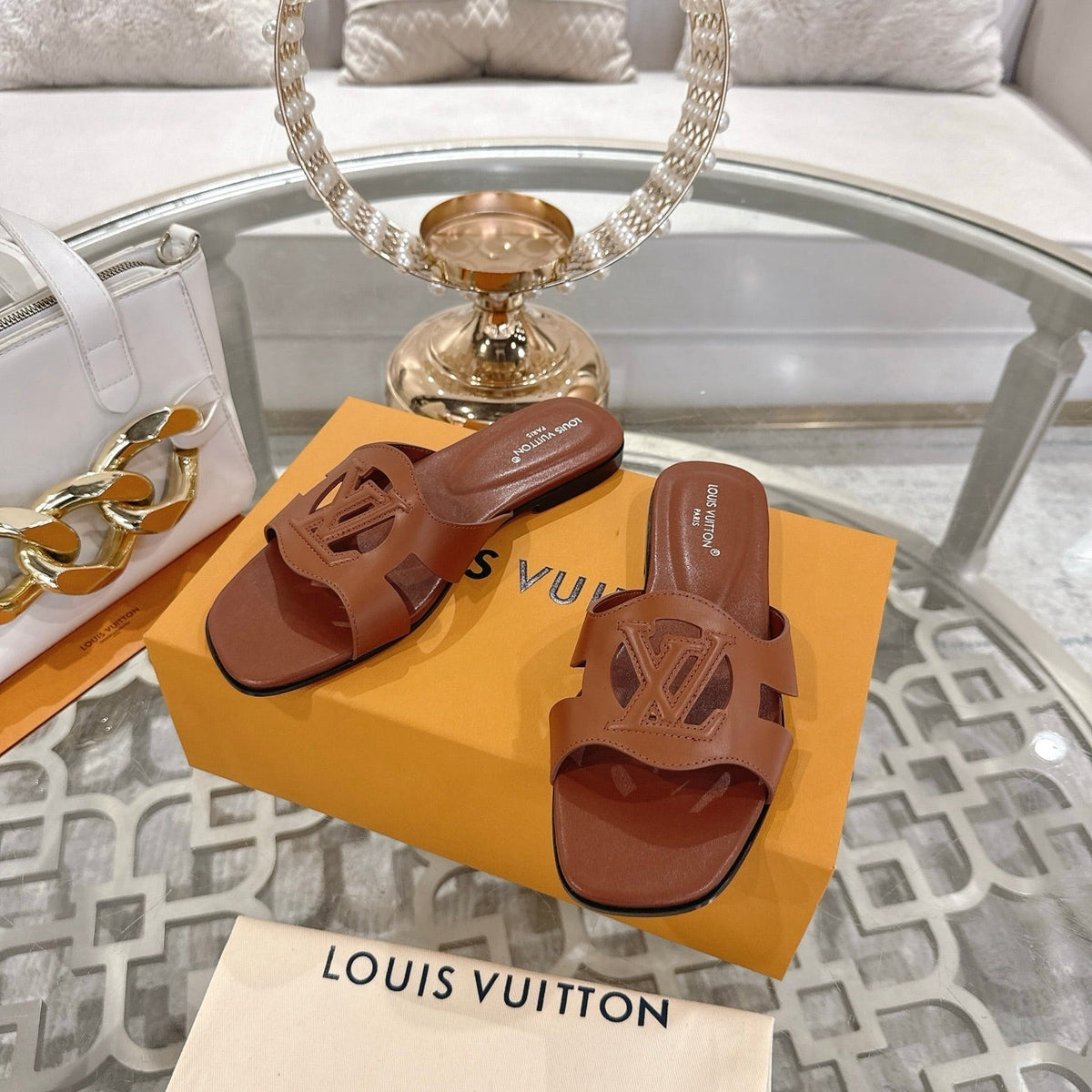 ISOLA FLAT SLIDE IN PENNY BROWN CALFSKIN