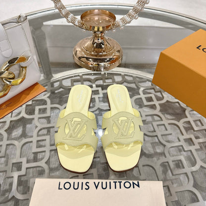 ISOLA FLAT SLIDE IN PALE YELLOW CALFSKIN