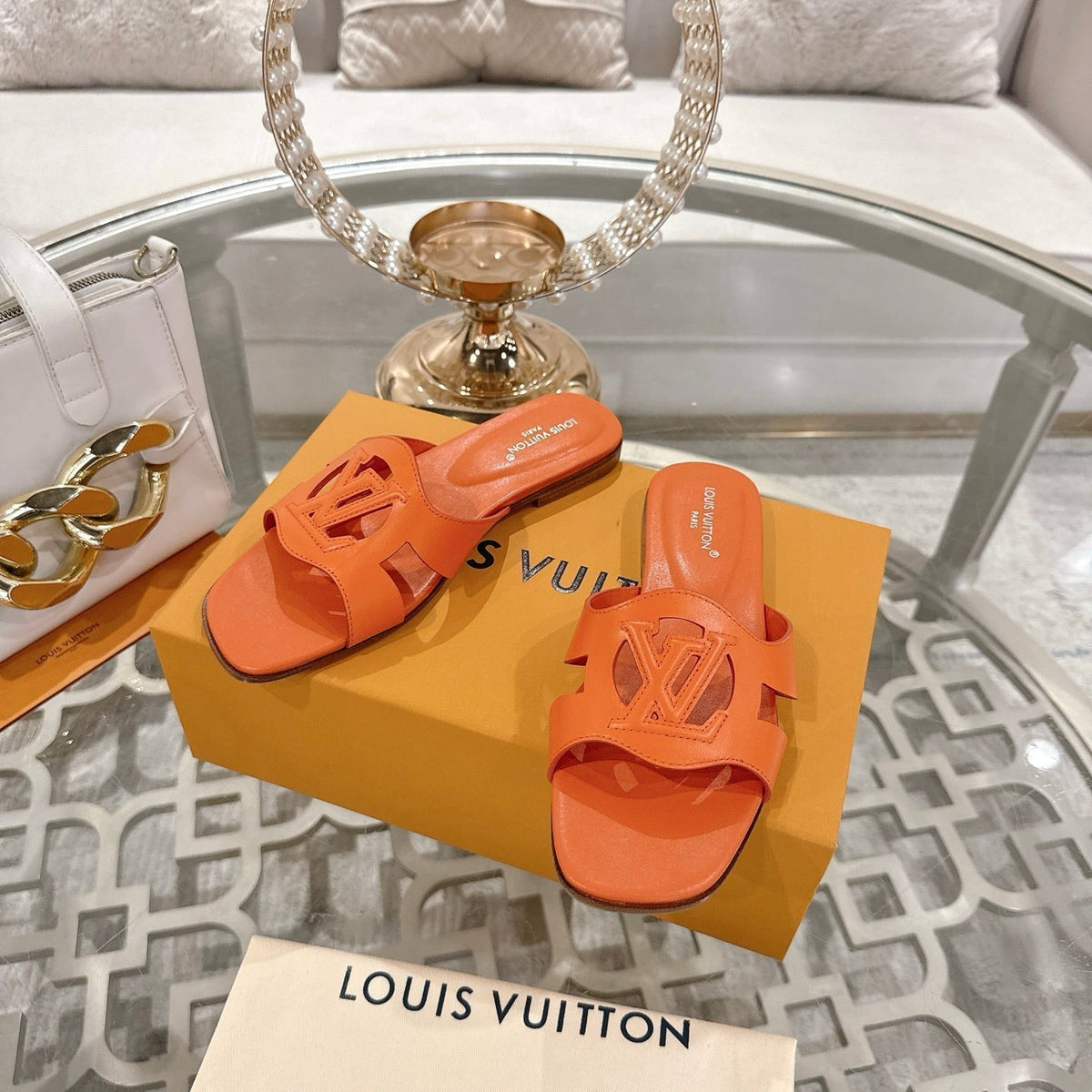 ISOLA FLAT SLIDE IN VIVID ORANGE CALFSKIN