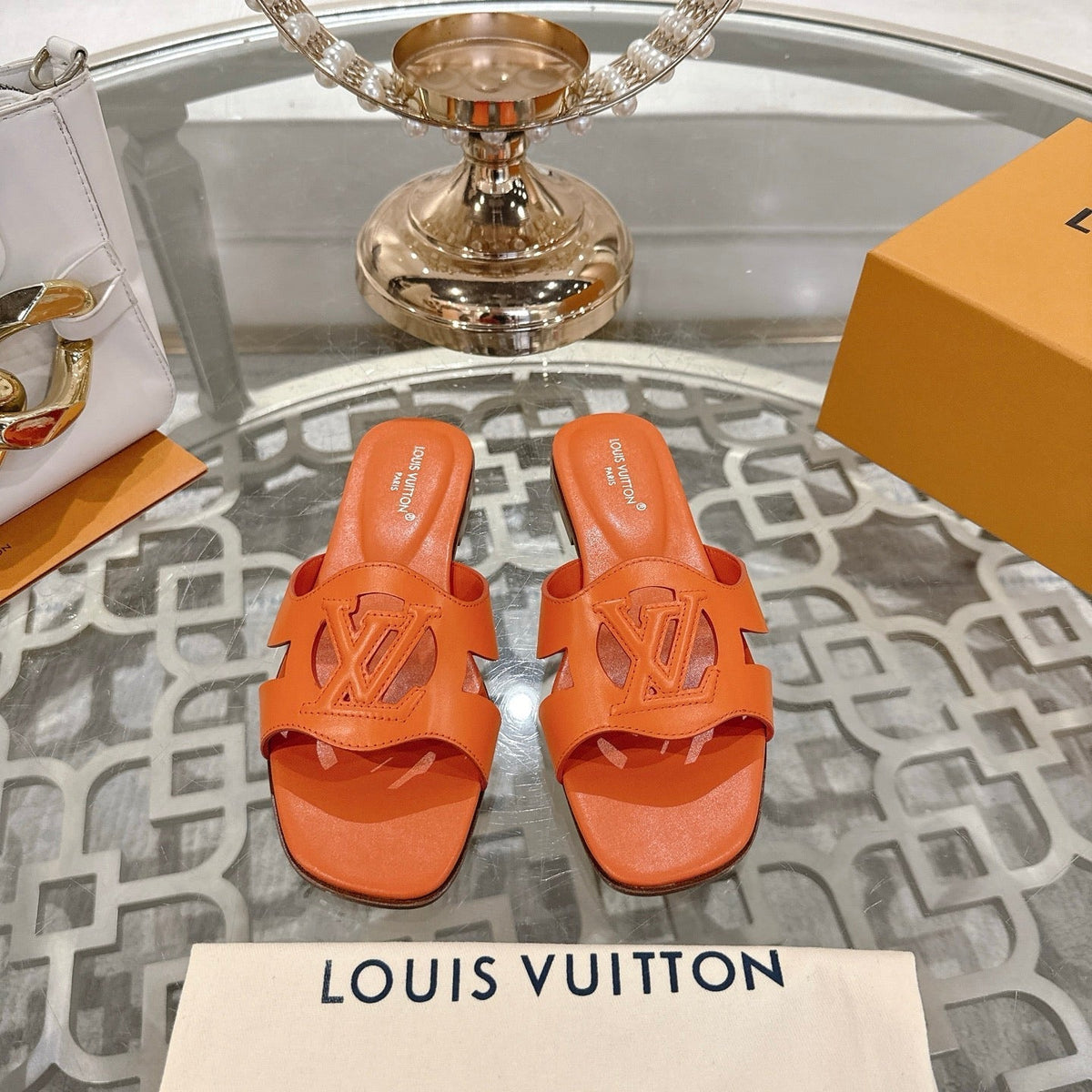 ISOLA FLAT SLIDE IN VIVID ORANGE CALFSKIN