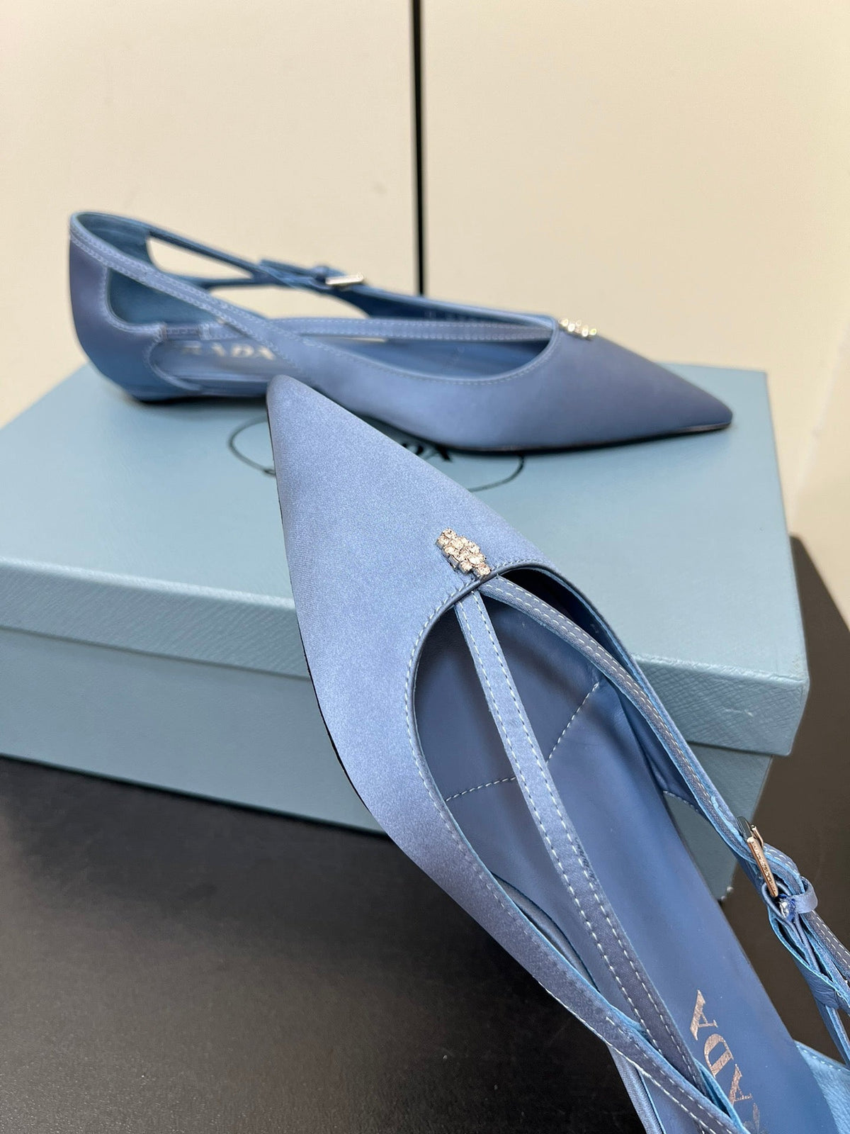 CUT-OUT BALLERINA FLAT IN PERANO BLUE SATIN ATTACHED BEAD BUCKLE