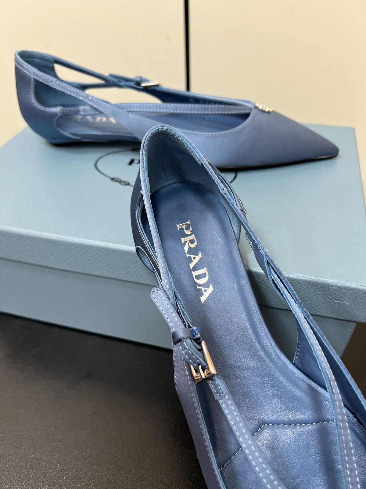 CUT-OUT BALLERINA FLAT IN PERANO BLUE SATIN ATTACHED BEAD BUCKLE