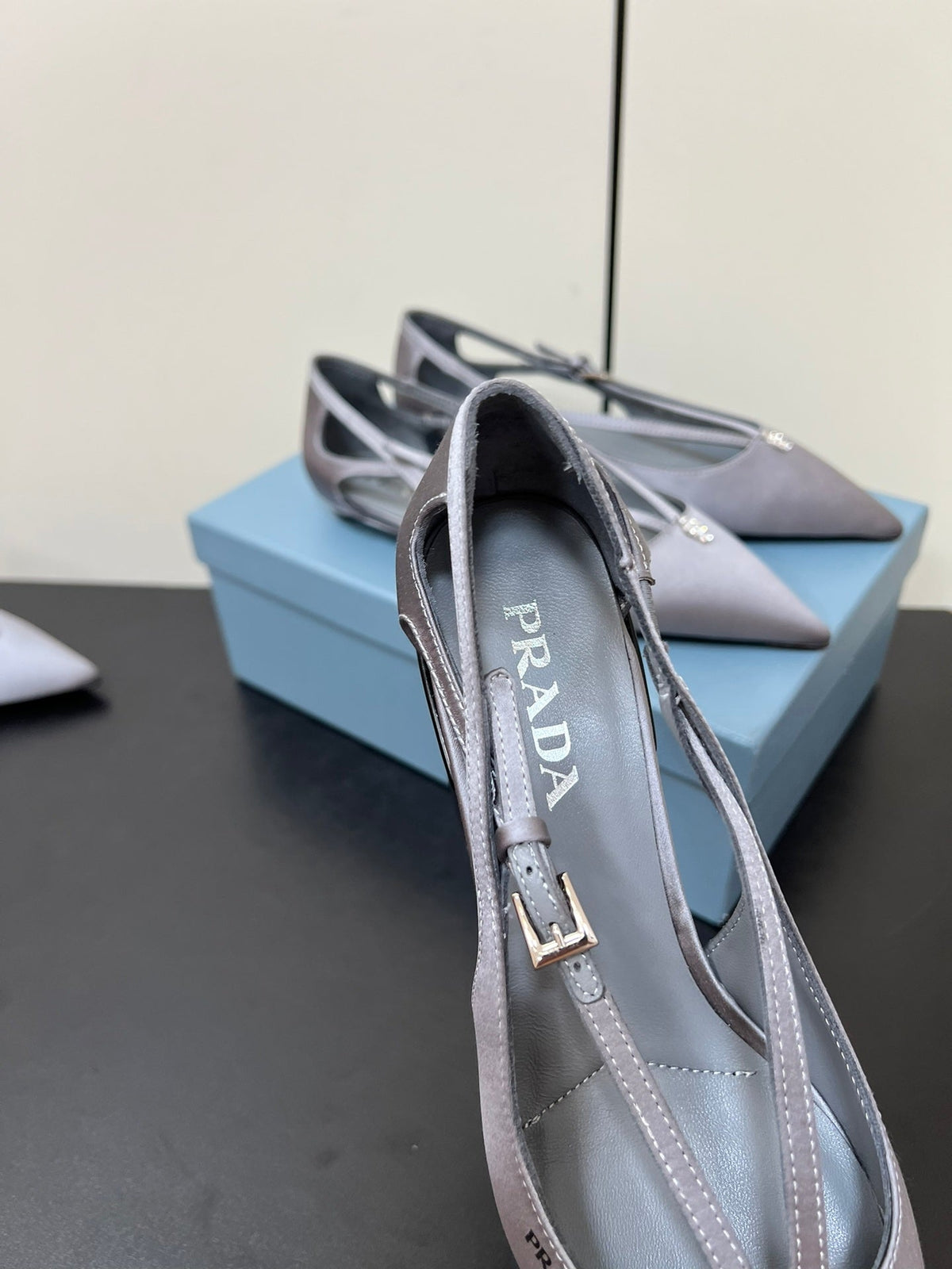 CUT-OUT BALLERINA FLAT IN WARM GRAY SATIN ATTACHED BEAD BUCKLE