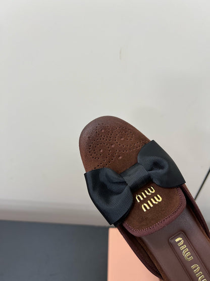 BOW MULES IN CHOCOLATE SUEDE