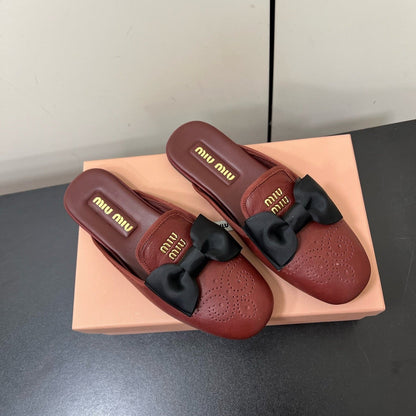 BOW MULES IN RED BROWN SHEEPSKIN