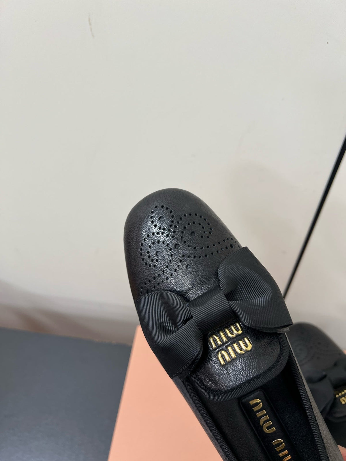 LOAFERS WITH BOW IN BLACK SHEEPSKIN