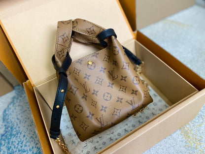 ATLANTIS BB 17 IN BROWN MONOGRAM REVERSE CANVAS