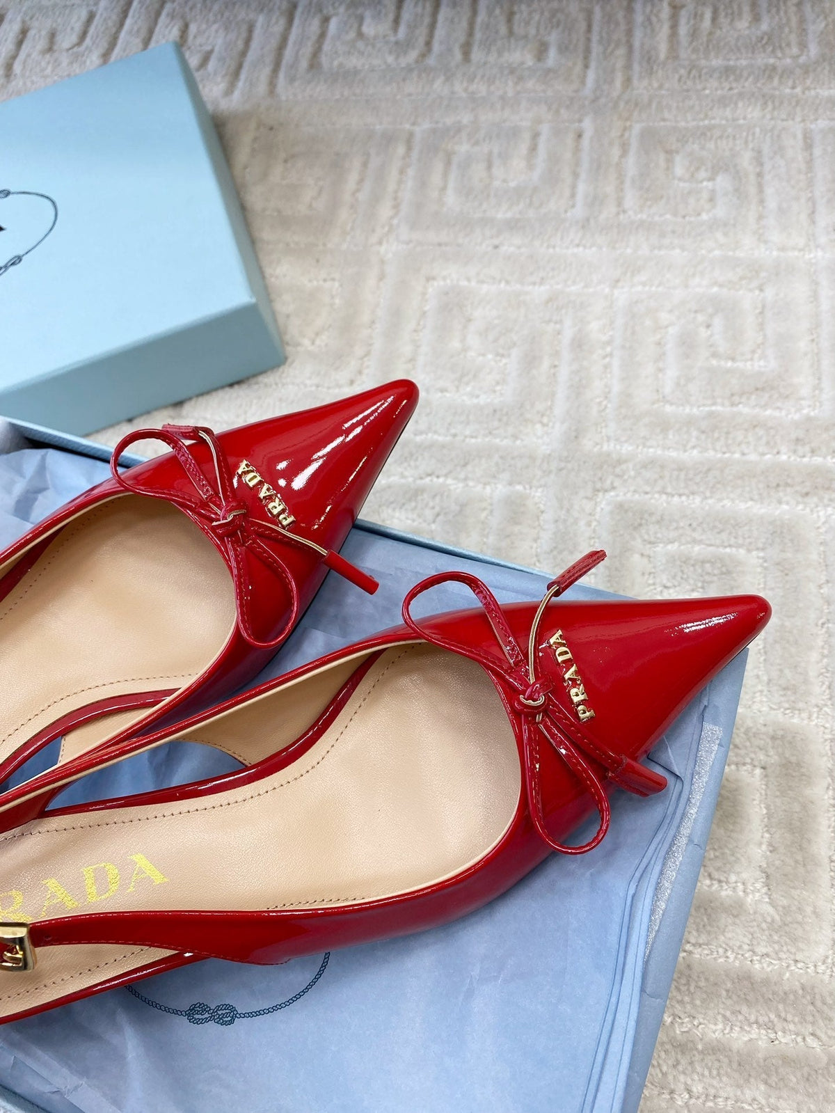 SLINGBACK PUMPS ATTACHED BOW IN PASSION RED GLOSSY CALFSKIN