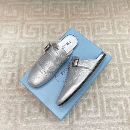 TASSEL MULES IN SILVER METALLIC LAMBSKIN