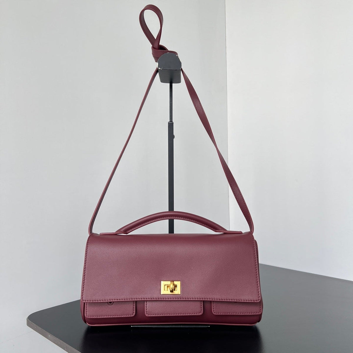 BEL AIR CLUTCH 27 IN BURGUNDY RED NAPPA LAMBSKIN GOLD HARDWARE