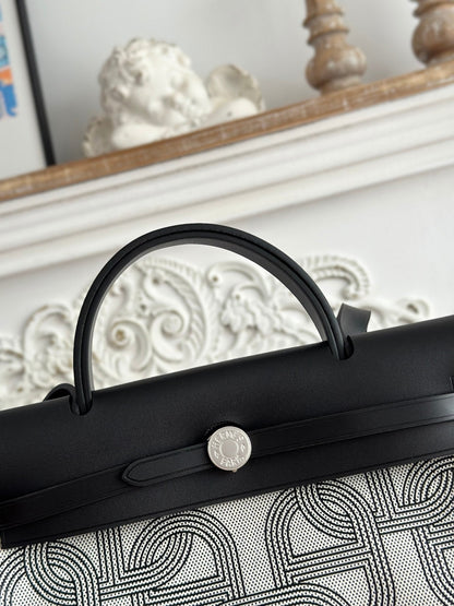 HERBAG ZIP 31 LAQUERED BAG IN OFF-WHITE MIX BLACK H PLUME CANVAS