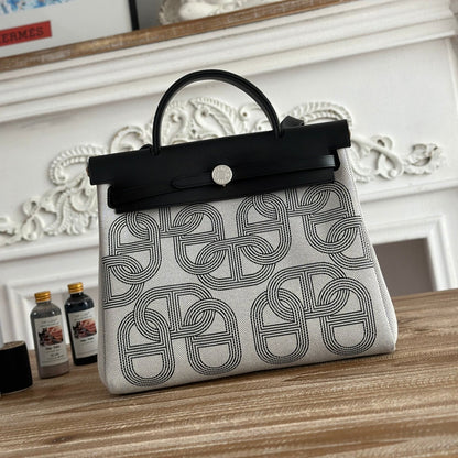 HERBAG ZIP 31 LAQUERED BAG IN OFF-WHITE MIX BLACK H PLUME CANVAS