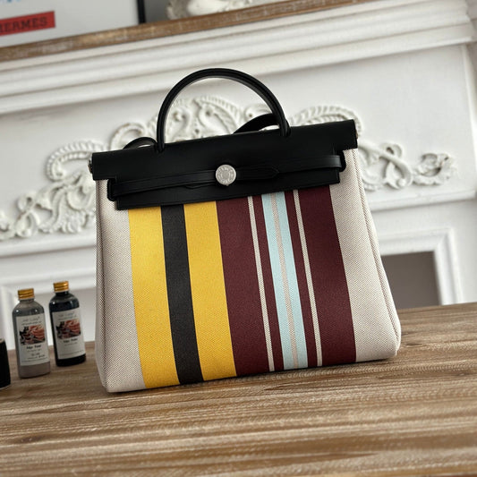 HERBAG ZIP 31 LAQUERED BAG IN BROWN MIX YELLOW H PLUME CANVAS