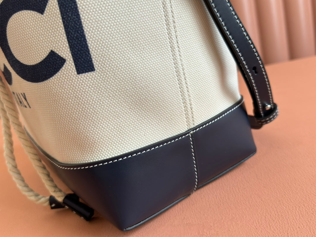 DRAWSTRING SHOULDER BAG LOGO PRINT 31 IN WHITE CANVAS DARK BLUE CALFSKIN