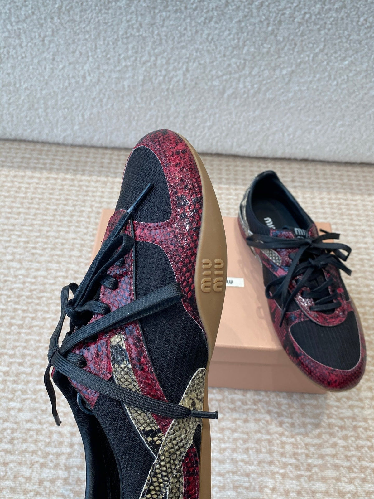 GYMNASIUM SNEAKER IN BLACK FABRIC AND BLACK RED SNAKE EFFECT CALFSKIN