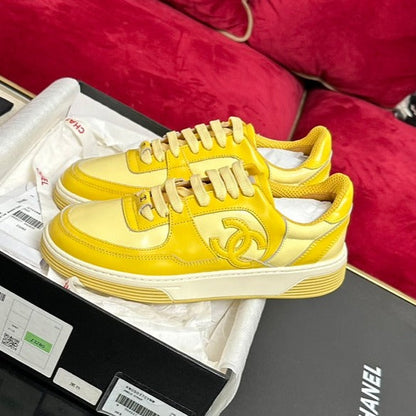 TRAINERS IN BRIGHT YELLOW SHINY CALFSKIN