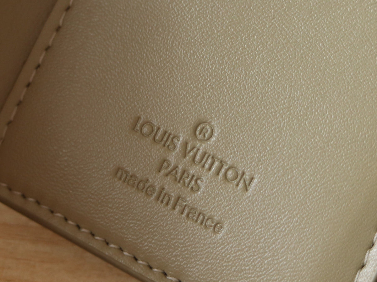 IRIS WALLET IN KHAKI BROWN EMBOSSED CALFSKIN