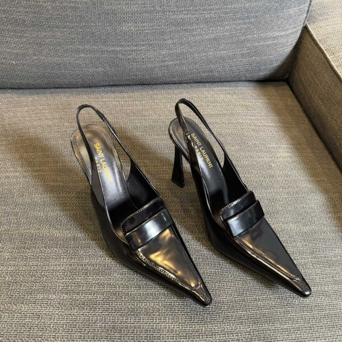 POINTED-TOE SLINGBACK PUMPS IN BLACK SHINY CALFSKIN